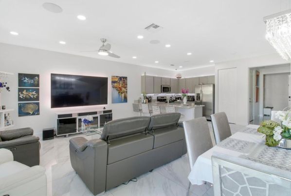 Chandelier, Dining room, Interior, Kitchen, Living room, Marble, Recessed Lighting, Stainless Steel Appliances