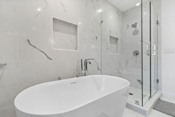 Bathroom, Free Standing Baths, Glass Shower, Interior, Marble Walls, Recessed Lighting