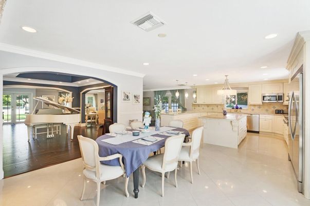 Dining room, Interior, Kitchen, Pendant Lights, Recessed Lighting, Stainless Steel Appliances, Wood Texture Flooring