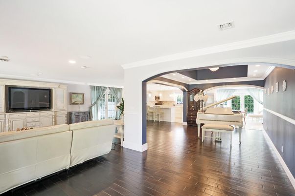 Dining room, Fireplace, Interior, Living room, Piano, Recessed Lighting, Wood Texture Flooring