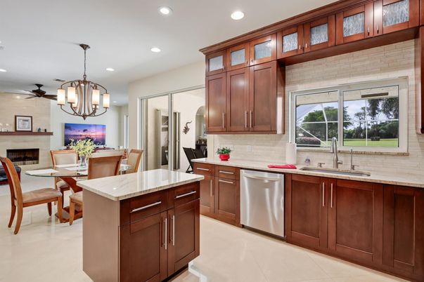 Chandelier, Dining room, Fireplace, Interior, Kitchen, Pendant Lights, Recessed Lighting, Stainless Steel Appliances