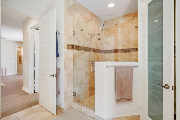 Bathroom, Glass Shower, Interior, Marble Walls, Recessed Lighting, Wood Texture Flooring