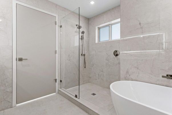 Bathroom, Free Standing Baths, Glass Shower, Interior, Marble Walls, Recessed Lighting