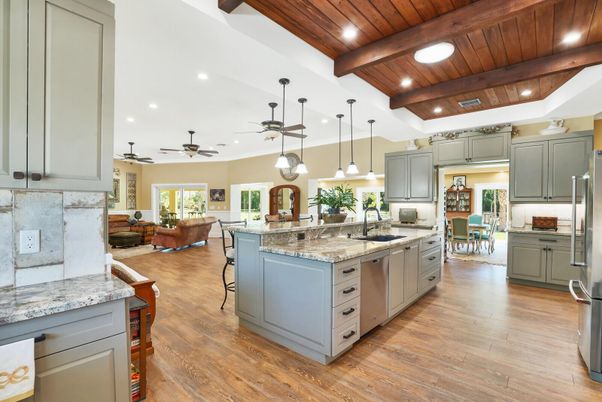 Dining room, Interior, Kitchen, Living room, Pendant Lights, Recessed Lighting, Stainless Steel Appliances, Wooden Beams, Wooden Ceilings, Wood Texture Flooring