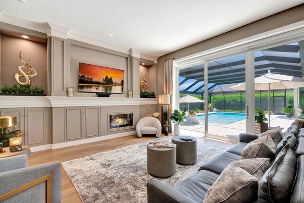 Fireplace, Interior, Living room, Recessed Lighting, Sun Room, Wood Texture Flooring