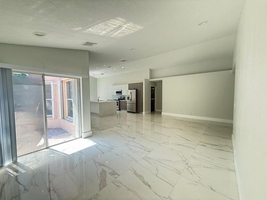 Empty room, Interior, Kitchen, Marble, Recessed Lighting, Stainless Steel Appliances