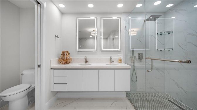 Bathroom, Dual Sink Vanities, Glass Shower, Interior, Marble, Marble Walls, Recessed Lighting