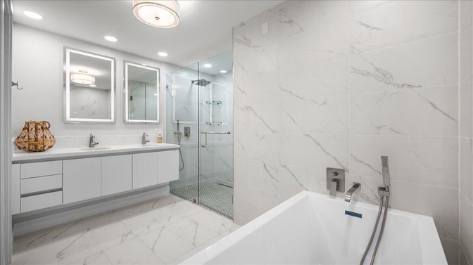 Bathroom, Dual Sink Vanities, Glass Shower, Interior, Marble, Marble Walls, Recessed Lighting
