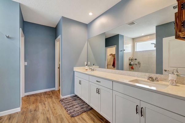 Bathroom, Dual Sink Vanities, Interior, Recessed Lighting, Wood Texture Flooring