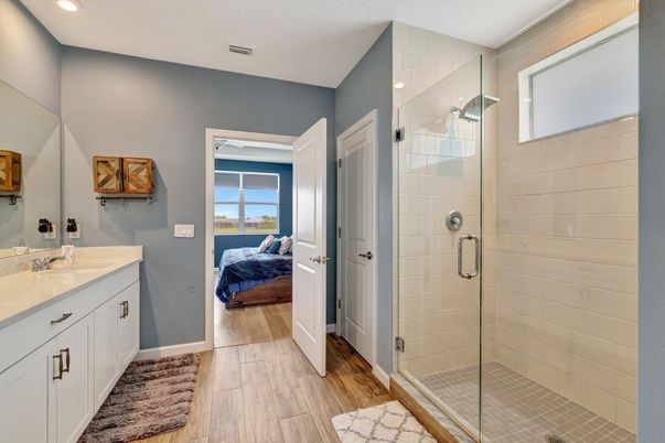 Bathroom, Bedroom, Glass Shower, Interior, Recessed Lighting, Wood Texture Flooring