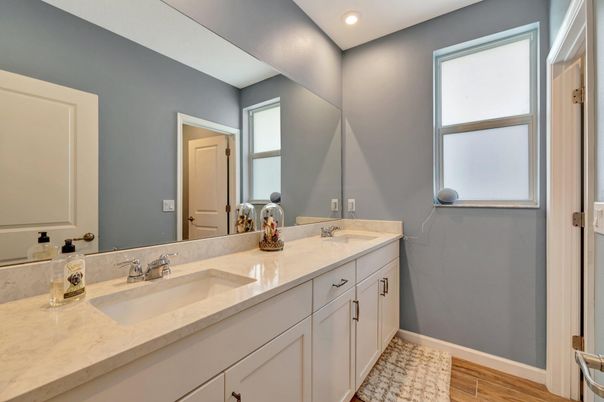 Bathroom, Dual Sink Vanities, Interior, Recessed Lighting, Wood Texture Flooring