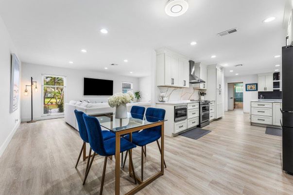 Dining room, Interior, Kitchen, Living room, Recessed Lighting, Stainless Steel Appliances, Wood Texture Flooring