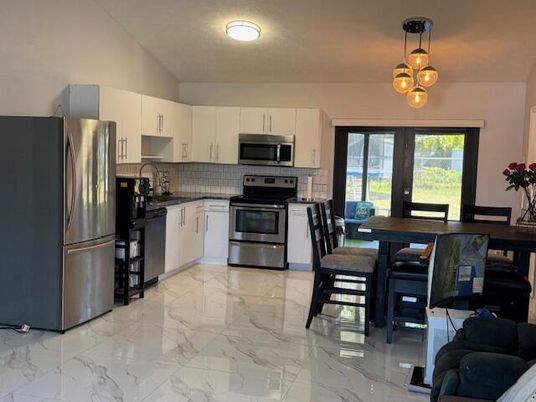 Dining room, Interior, Kitchen, Marble, Pendant Lights, Stainless Steel Appliances