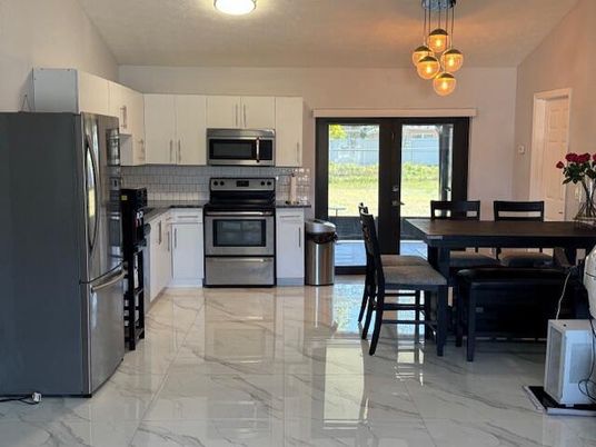 Dining room, Interior, Kitchen, Marble, Pendant Lights, Stainless Steel Appliances