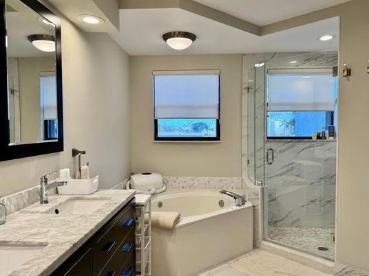Bathroom, Dual Sink Vanities, Glass Shower, Interior, Marble Walls, Recessed Lighting