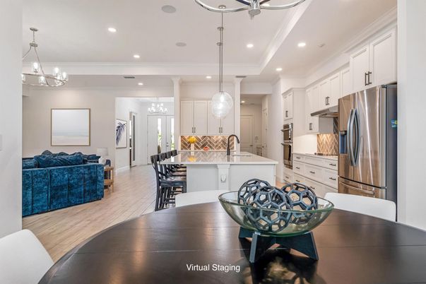 Chandelier, Interior, Kitchen, Living room, Pendant Lights, Recessed Lighting, Stainless Steel Appliances, Wood Texture Flooring