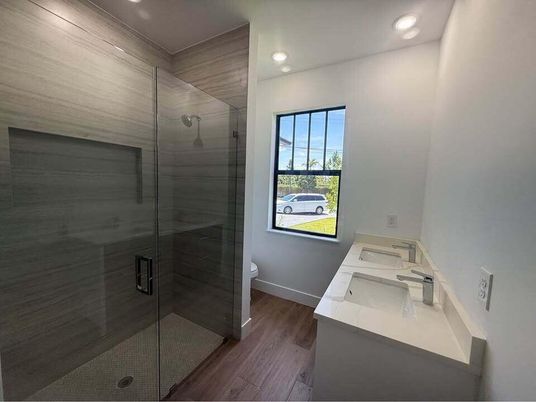 Bathroom, Glass Shower, Interior, Recessed Lighting, Wood Texture Flooring