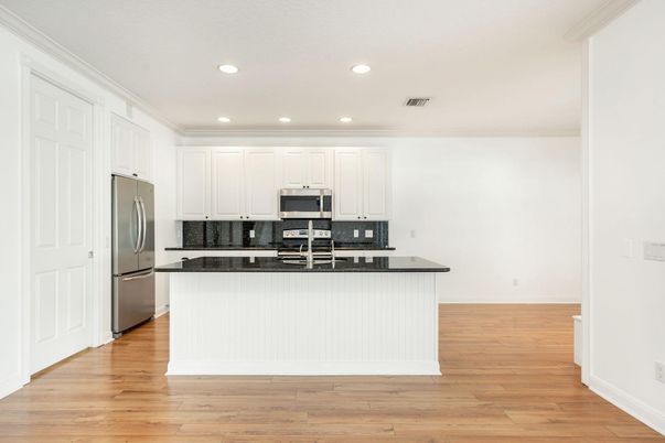 Interior, Kitchen, Recessed Lighting, Stainless Steel Appliances, Wood Texture Flooring