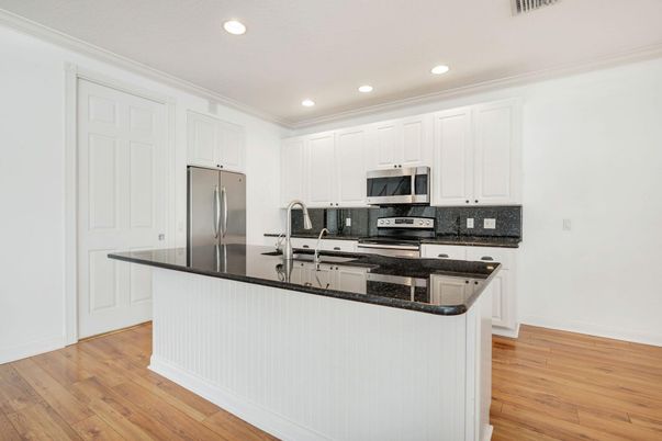 Interior, Kitchen, Recessed Lighting, Stainless Steel Appliances, Wood Texture Flooring