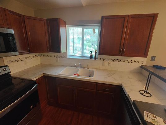 Interior, Kitchen, Tile Countertops, Wood Texture Flooring