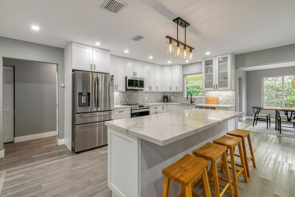 Dining room, Interior, Kitchen, Pendant Lights, Recessed Lighting, Stainless Steel Appliances, Wood Texture Flooring