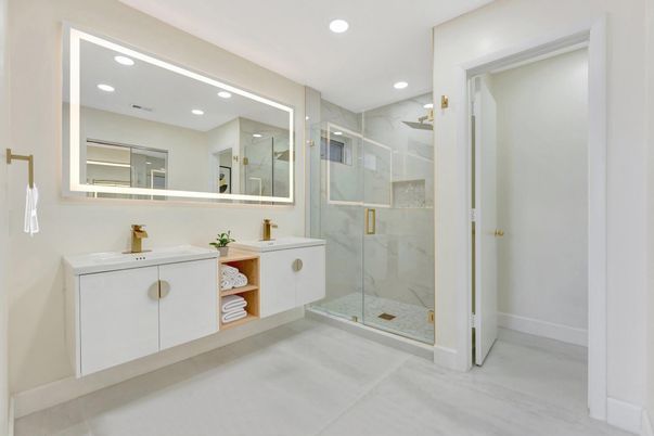 Bathroom, Dual Sink Vanities, Glass Shower, Interior, Marble Walls, Recessed Lighting