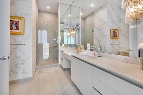 Bathroom, Chandelier, Dual Sink Vanities, Glass Shower, Interior, Marble Walls, Recessed Lighting