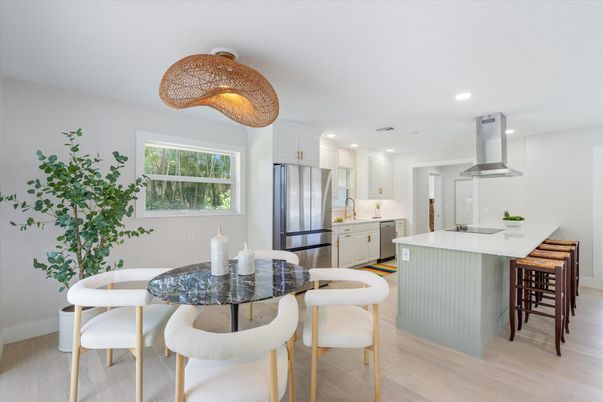 Dining room, Interior, Kitchen, Recessed Lighting, Stainless Steel Appliances, Wood Texture Flooring