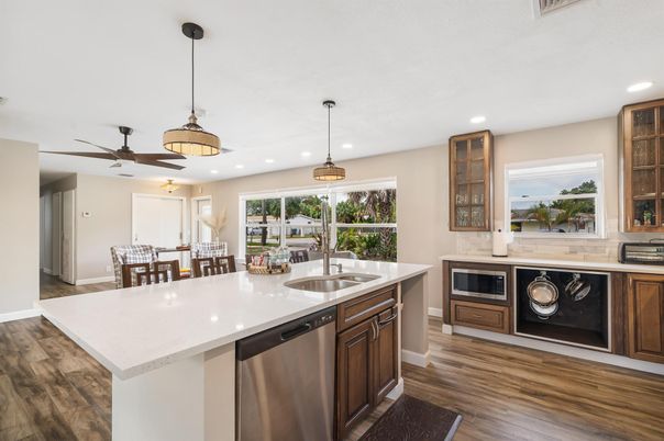 Dining room, Interior, Kitchen, Pendant Lights, Recessed Lighting, Stainless Steel Appliances, Wood Texture Flooring