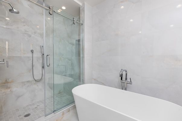 Bathroom, Free Standing Baths, Glass Shower, Interior, Marble Walls, Recessed Lighting
