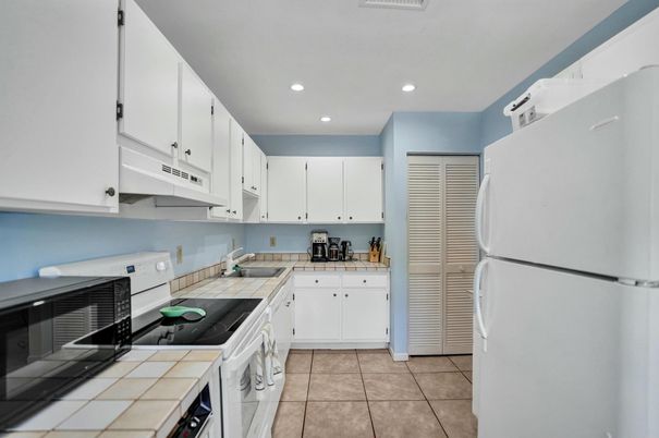 Interior, Kitchen, Recessed Lighting, Tile Countertops