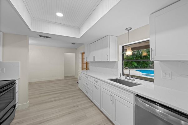 Interior, Kitchen, Pendant Lights, Recessed Lighting, Stainless Steel Appliances, Wood Texture Flooring