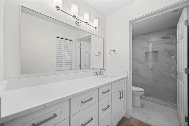 Bathroom, Dual Sink Vanities, Glass Shower, Interior, Marble Walls