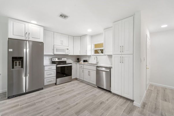 Interior, Kitchen, Recessed Lighting, Stainless Steel Appliances, Wood Texture Flooring