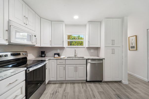 Interior, Kitchen, Recessed Lighting, Stainless Steel Appliances, Wood Texture Flooring