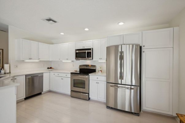 Interior, Kitchen, Recessed Lighting, Stainless Steel Appliances, Wood Texture Flooring