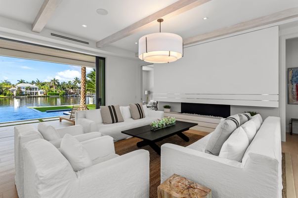Fireplace, Interior, Living room, Pendant Lights, Recessed Lighting, Water, Wood Texture Flooring
