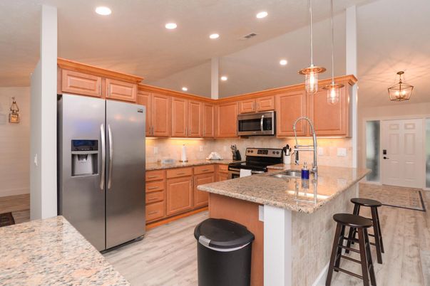 Interior, Kitchen, Pendant Lights, Recessed Lighting, Stainless Steel Appliances, Wood Texture Flooring