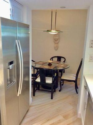 Dining room, Interior, Kitchen, Pendant Lights, Stainless Steel Appliances, Wood Texture Flooring