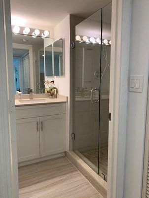 Bathroom, Dual Sink Vanities, Glass Shower, Interior, Wood Texture Flooring