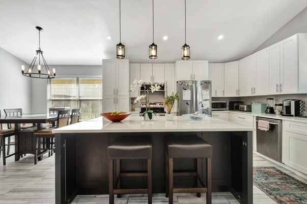Dining room, Interior, Kitchen, Pendant Lights, Recessed Lighting, Stainless Steel Appliances, Wood Texture Flooring