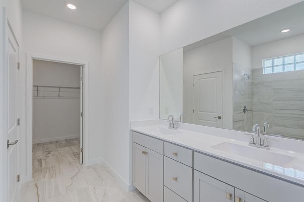 Bathroom, Dual Sink Vanities, Interior, Marble, Recessed Lighting, Walk-in Closets