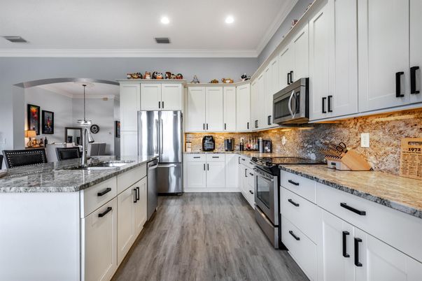 Interior, Kitchen, Pendant Lights, Recessed Lighting, Stainless Steel Appliances, Wood Texture Flooring