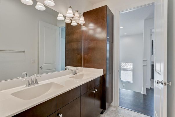 Bathroom, Dual Sink Vanities, Interior, Recessed Lighting, Wood Texture Flooring