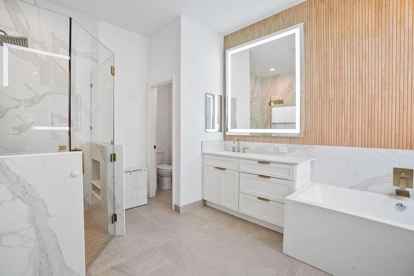 Bathroom, Dual Sink Vanities, Glass Shower, Interior, Marble Walls, Recessed Lighting