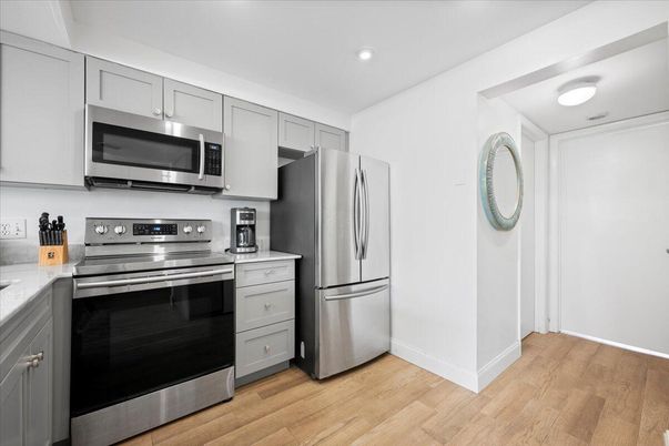 Interior, Kitchen, Recessed Lighting, Stainless Steel Appliances, Wood Texture Flooring