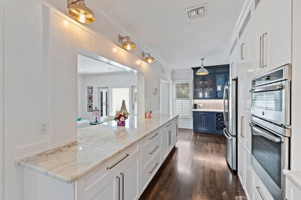 Interior, Kitchen, Pendant Lights, Stainless Steel Appliances, Tile Countertops, Wood Texture Flooring