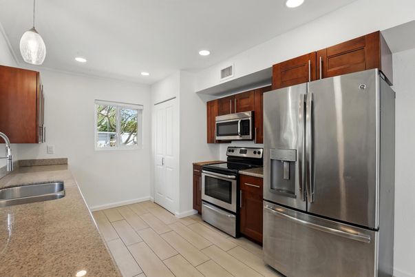 Interior, Kitchen, Pendant Lights, Recessed Lighting, Stainless Steel Appliances, Wood Texture Flooring