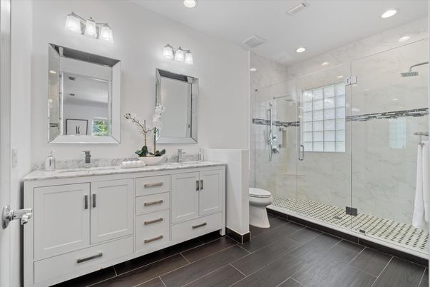 Bathroom, Dual Sink Vanities, Glass Shower, Interior, Marble Walls, Recessed Lighting