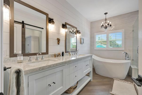 Bathroom, Chandelier, Dual Sink Vanities, Free Standing Baths, Interior, Wood Texture Flooring